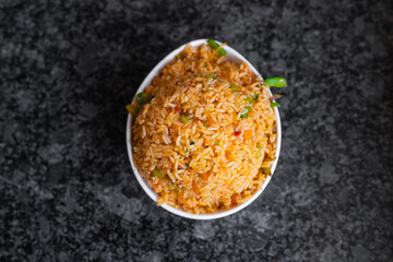 Schezwan fried rice is a popular fried rice variety from Indo-Chinese cuisine.