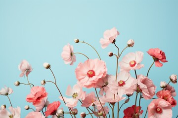 Pink flowers grouped on a light blue and pink background. Generative AI