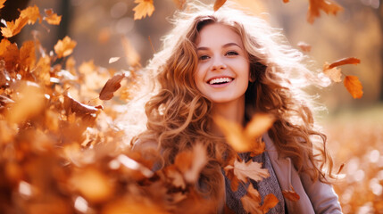 Naklejka na ściany i meble Beautiful fashion model woman face on autumn leafs, brunette girl