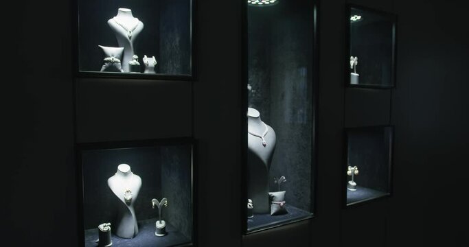 Showroom of a jewelry store with jewelry on the wind. Rings, bracelets, necklaces.