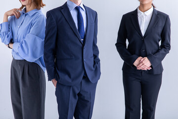 Obraz na płótnie Canvas スーツを着た複数の男女 　Business