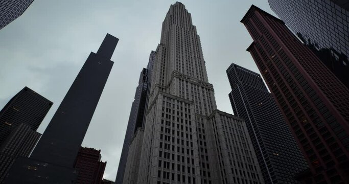 Business district building with wall mirror with cloudy sky