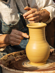 making pottery by hands as background.