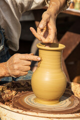 making pottery by hands as background.