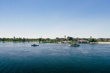 Fototapeta premium Egyptian Luxury: Luxor Port from Nile Cruise Ship. Egypt Summer Travel