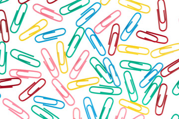 multicolored paper clips isolated on white background. close up