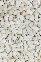 White decorative gravel close up. marble chips stone fraction background texture. (