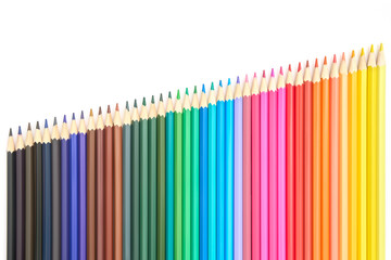 colorful rainbow pencils over white background, back to school concept, school and creativity...