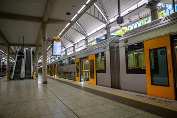 Foto op Plexiglas Sydney/Australia- March 20, 2019: NSW Sydney Train in action, it is the suburban passenger rail network serving the city of Sydney, New South Wales, Australia © Bounpaseuth