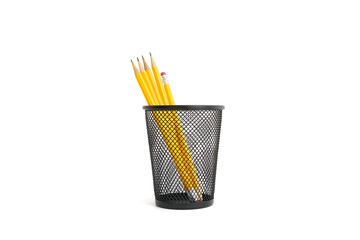 Pen holder full of pencils on isolated background