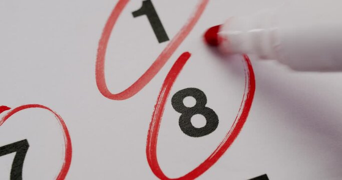 Person starting new life from first day of month, forming new habits and marking date circling red marker in calendar, closeup. Challenge concept. calendar stop motion. important date time lapse.