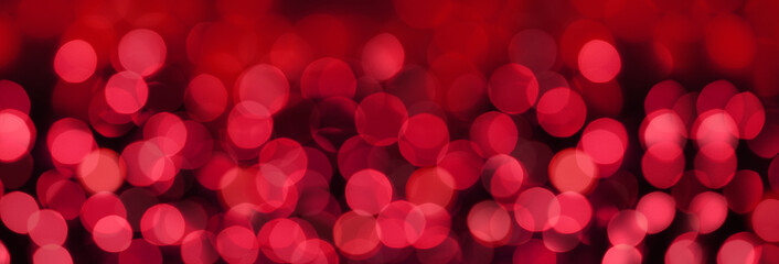 red background colored blur texture bokeh, round defocused abstract christmas, wedding wallpaper,...