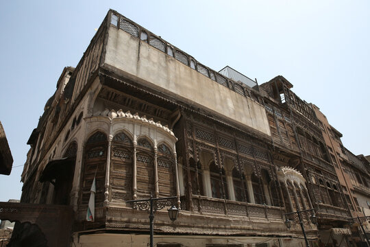 Bazaar e Kalaan. Qissa Khwani, food street in Peshawar, Pakistan. Pakistani ancient, old architecture, building facade, wooden house. Peshawar landmark