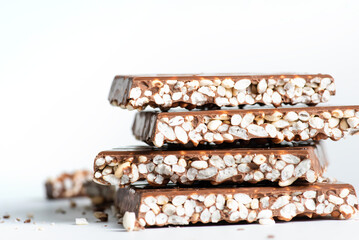 Chunks of milk chocolate with puffed rice