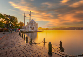Ortakoy Istanbul landscape beautiful sunrise with clouds Ortakoy Mosque and Bosphorus Bridge, Istanbul Turkey. Best touristic destination of Istanbul - obrazy, fototapety, plakaty