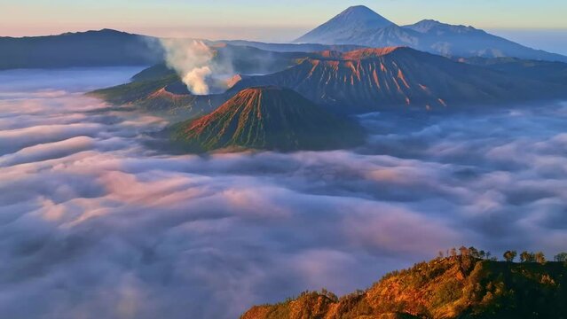 Aerial view of Amazing Mount Bromo volcano during sunrise sky,Beautiful Mountains Penanjakan in Bromo Tengger Semeru National Park,East Java,Indonesia.Nature landscape background