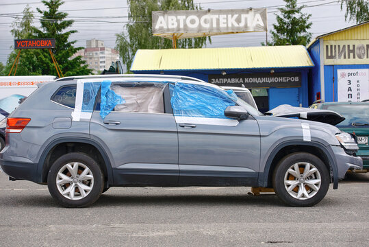 Minsk, Belarus. Jun 14, 2022. VW Atlas car stand on parking lot, damaged car delivered from auction. Buying and shipping salvage American's automobiles. Damaged vehicle purchased at auction