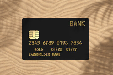 Top View of Black Plastic Golden Credit Card with Chip and Palm Tree Leaf Shadow on Sand Background. 3d Rendering