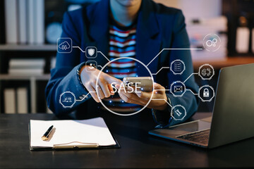 SASE Secure Access Service Edge concept Hand touching Secure Access Service Edge icon on virtual screen background, password, network, framework and support technology in office