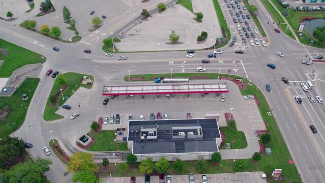 Aerial view of semi truck tanker parked and brought fuel for gas station, location in Vernon Hills, Illinois, USA. Casey gas station, Hawthorn Mall. Urban transportation concept.