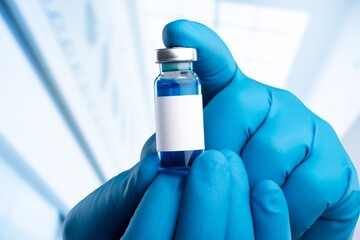 Vaccination concept. Doctor hold vial of vaccine