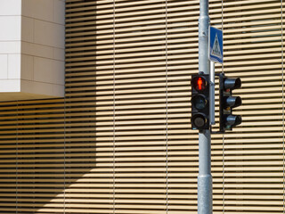traffic light, urban detail with architectural detail background
