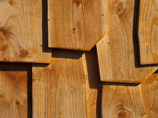 wooden planks with different cuts and shadow, background
