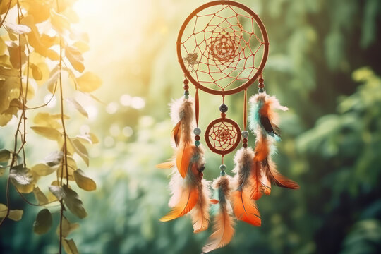 Dreamcatcher with feathers and butterflies. Watercolor ethnic dreamcatcher