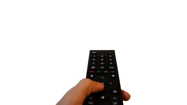 television remote Black TV remote control with hand holding the button as if turning the TV on or off. Isolated illustration on white background.