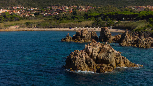The rocky and sandy beach of Di Cala in the north-west of Sardinia. Drone photos taken on a sunny day.