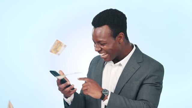 Phone, money and black man in a studio for celebration of lottery, prize or financial winning. Happy, excited and African male model on cellphone with cash for success isolated by white background.