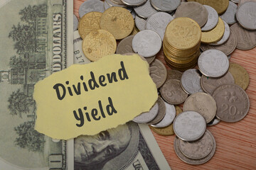 The text Dividend yield is a financial ratio that measures the annual dividend income an investor...