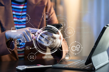 Zero trust security concept Person using computer and tablet with zero trust icon on virtual screen...