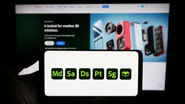 Stuttgart, Germany - 09-23-2023: Person holding smartphone with logo of software product Adobe Substance 3D on screen in front of website. Focus on phone display.
