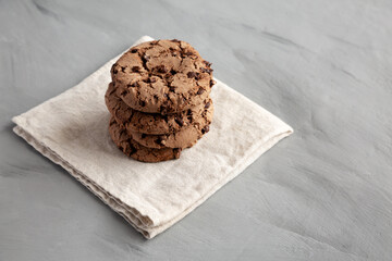 Fresh Dark Chocolate Chip Cookies, side view. Copy space.