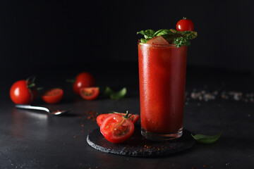 A glass with cold bloody mary cocktail