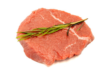 Beef round slice isolated on white background. Raw beef round with herbs and spices