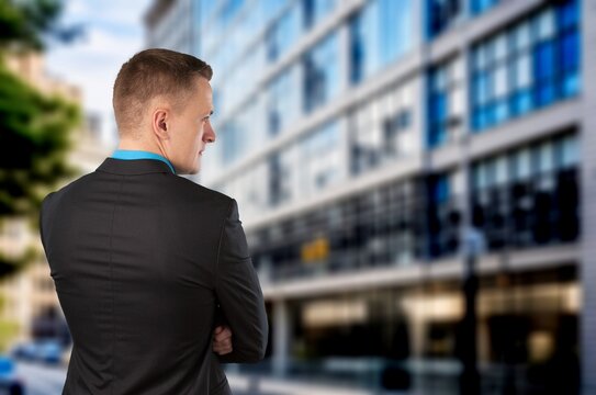 Business man posing at city street, AI generated image