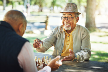 Elderly men in park, chess game and winner of competition or challenge, friends in retirement and...
