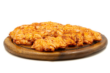 Chicken wings with sauce isolated on white background. Raw chicken wings with herbs and spices