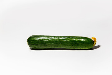 fresh green cucumber on a white background isolated