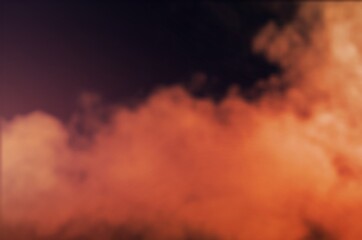 Colored red smoke steam on a dark background.