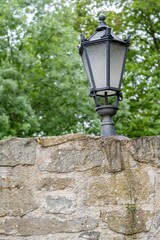 old street lantern on a wall