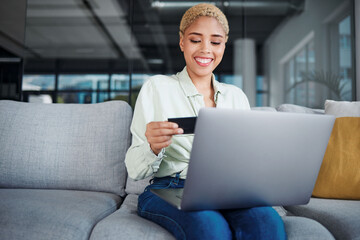 Woman, laptop and credit card with online shopping and happy about discount on store website,...