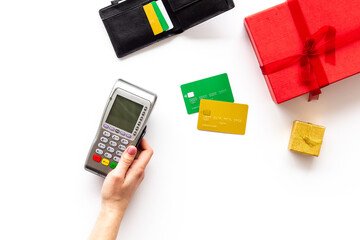 Payment by credit card in store. Payment terminal with cards. Shopping concept