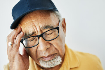 Headache, pain and face of senior man with fatigue, burnout or problem with health on white...