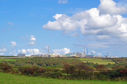 Orano La Hague, the worlds largests nuclear storage and uranium recycling facility, seen from the coastal footpath "Chemin des douaniers" (GR 223) in Cotentin region of Normandy, France
