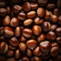 Fresh chestnuts on wooden background
