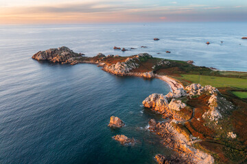 .Drone view of Primel Tregastel, ocean coast in France, Brittany at sunset.
