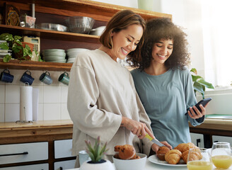 Lgbtq, couple and women with smartphone and cooking with happiness in kitchen for breakfast or...